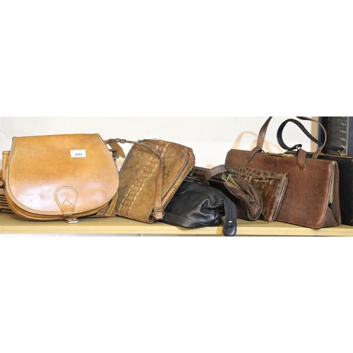 3002 - Six mixed ladies handbags including crocodile and a fishing creel. P&P Group 3 (£25+VAT)