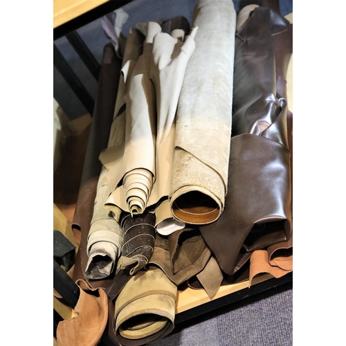 3046 - Quantity of rolled brown leather. Not available for in-house P&P