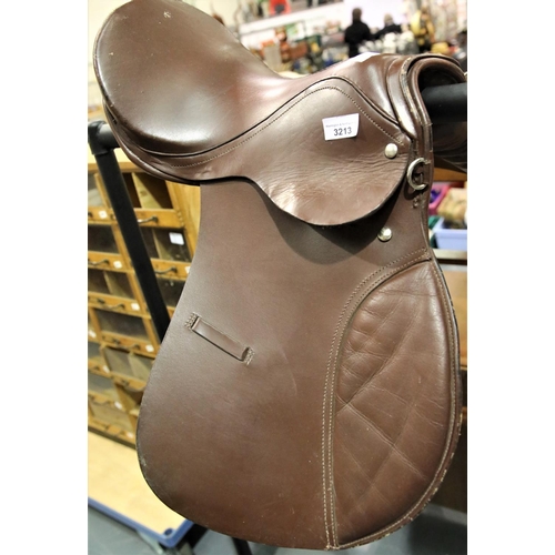 3213 - Brown leather saddle. P&P Group 3 (£25+VAT)