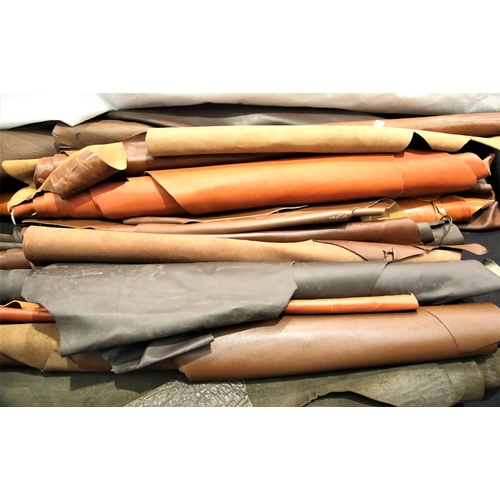 3236 - Quantity of rolled brown leather. Not available for in-house P&P