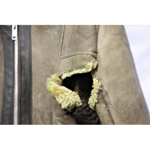 3198 - English sheepskin vintage flying jacket with 20 cm tear to armpit. P&P Group 3 (£25+VAT)