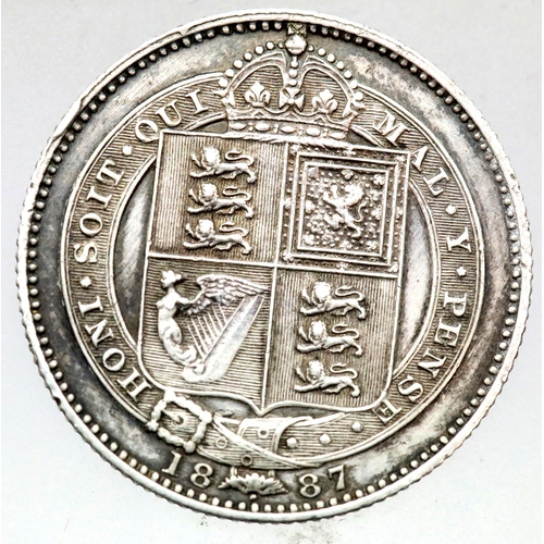 1140 - 1887 - Silver Shilling of Queen Victoria. P&P Group 1 (£14+VAT for the first lot and £1+VAT for subs... 