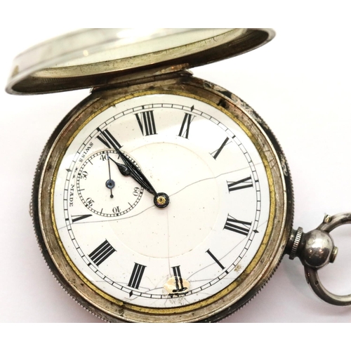 1018 - Continental 935 silver pocket watch and key, working at lotting. P&P Group 1 (£14+VAT for the first ... 