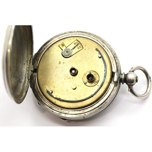 1018 - Continental 935 silver pocket watch and key, working at lotting. P&P Group 1 (£14+VAT for the first ... 