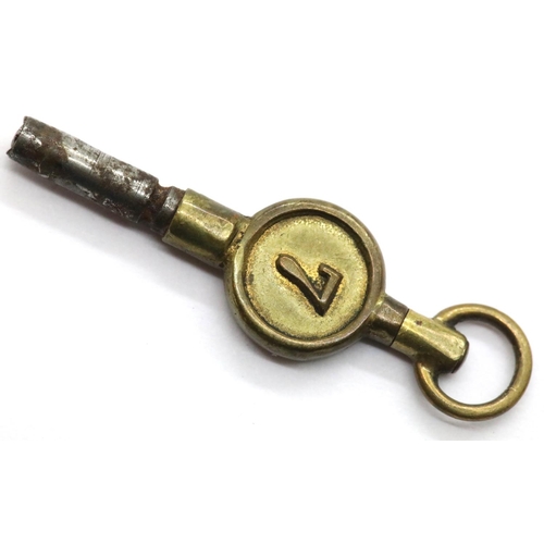 1018 - Continental 935 silver pocket watch and key, working at lotting. P&P Group 1 (£14+VAT for the first ... 