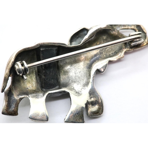 1040 - Silver marcasite and enamel elephant brooch, L: 3 cm, 8g. P&P Group 1 (£14+VAT for the first lot and... 