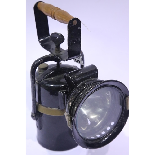 1215 - Steel and brass LNER railway lamp with wooden handle. P&P Group 2 (£18+VAT for the first lot and £3+... 