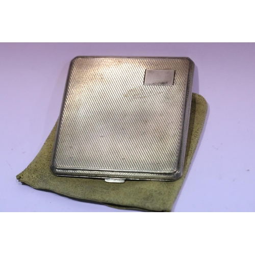 1268 - Hallmarked silver cigarette / card case with gilt interior in original pouch, Birmingham assay 1939,... 