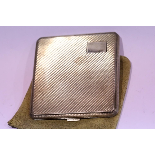 1268 - Hallmarked silver cigarette / card case with gilt interior in original pouch, Birmingham assay 1939,... 