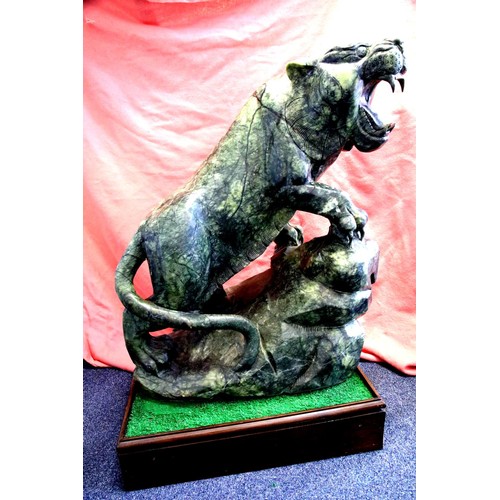 1510 - Large Jade roaring tiger, cut from a single piece, imported from Korea c1995, weighs approximately 3... 