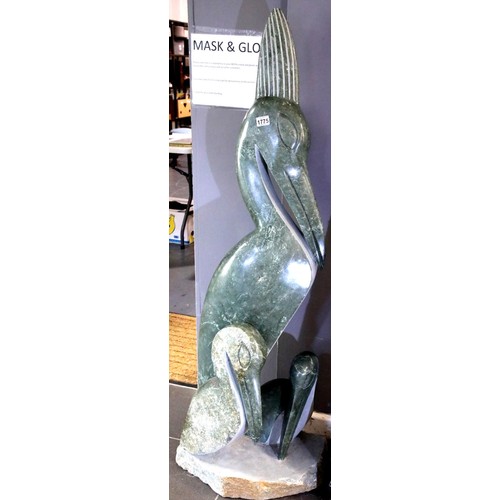 1513 - Large sculptured soapstone Pelican and Chicks, H: 143 cm. Not available for in-house P&P.