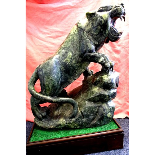 1510 - Large Jade roaring tiger, cut from a single piece, imported from Korea c1995, weighs approximately 3... 