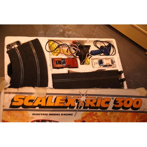 64 - Boxed Scalextric 300 racing car set with two original cars. Not available for in-house P&P