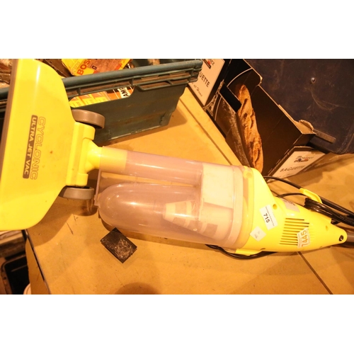 561 - Cyclonic upright vacuum cleaner. Not available for in-house P&P.
Condition Report: All electrical it... 