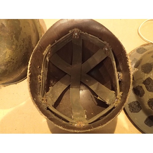 371 - Four military helmets with liners, various designs and conditions. Not available for in-house P&P