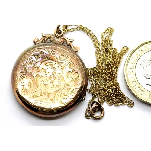 1002 - 9ct gold back and front locket on a 9ct gold chain, L: 43cm, 5.3g. P&P Group 1 (£14+VAT for the firs... 
