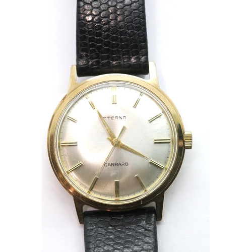 1017 - Eterna Garrard gents gold wristwatch. P&P Group 1 (£14+VAT for the first lot and £1+VAT for subseque... 