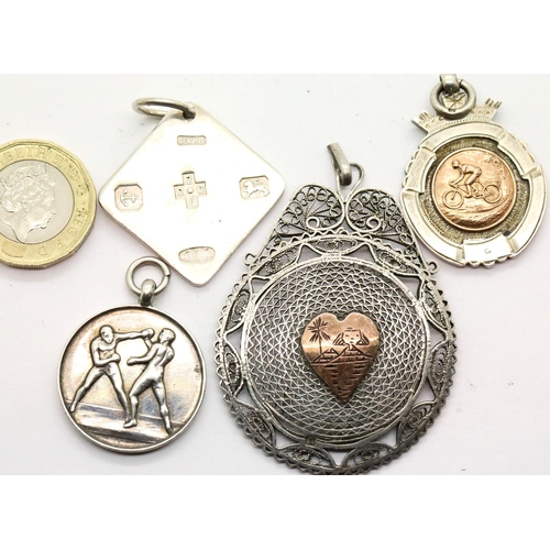 1056 - Four silver pendants including a C Milling fob, 38g. P&P Group 1 (£14+VAT for the first lot and £1+V... 