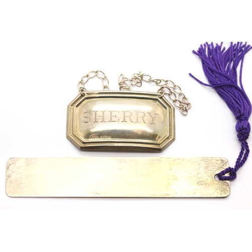 1065 - Hallmarked silver sherry decanter label and a silver bookmark, 19g. P&P Group 1 (£14+VAT for the fir... 