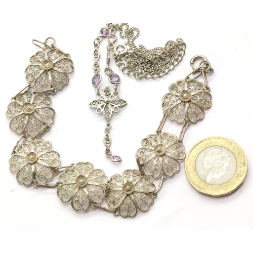 1060 - Silver flower necklace and bracelet set. P&P Group 1 (£14+VAT for the first lot and £1+VAT for subse... 