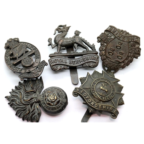 1228 - Five British Officers Bronze Cap Badges. P&P Group 1 (£14+VAT for the first lot and £1+VAT for subse... 