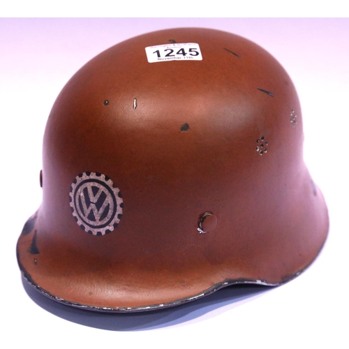 1245 - WWII German Light Weight Fire Helmet and liner, with the VW Factory Logo. P&P Group 2 (£18+VAT for t... 