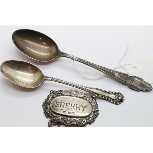 1338 - Two hallmarked silver teaspoons and a hallmarked silver sherry decanter label, total weight 60g, var... 