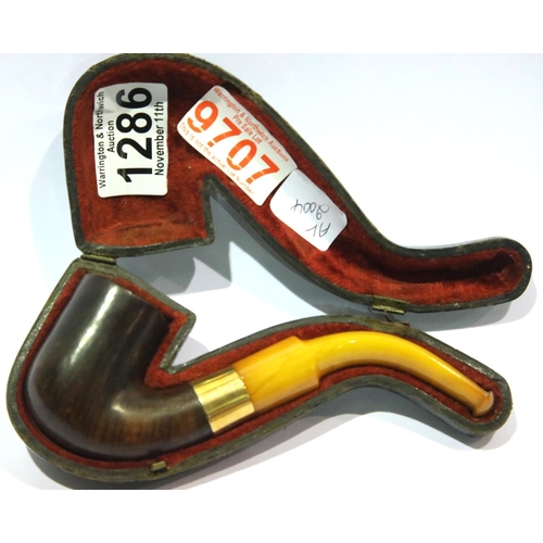 1286 - Leather cased briar pipe with 15ct gold band and amber stem. P&P Group 1 (£14+VAT for the first lot ... 