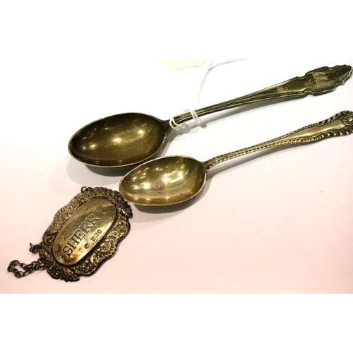 1338 - Two hallmarked silver teaspoons and a hallmarked silver sherry decanter label, total weight 60g, var... 