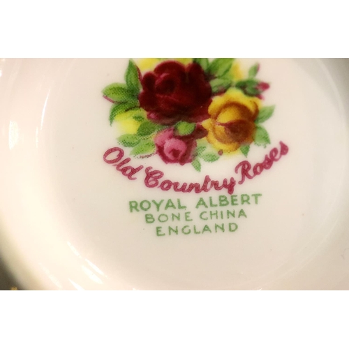 1406 - Royal Albert Old Country Roses dinner and tea service of forty-six pieces, all first quality, some w... 