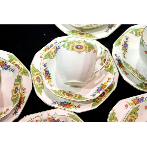 1489 - Alfred Meakin 21 piece tea service with a decorative floral pattern. Not available for in-house P&P