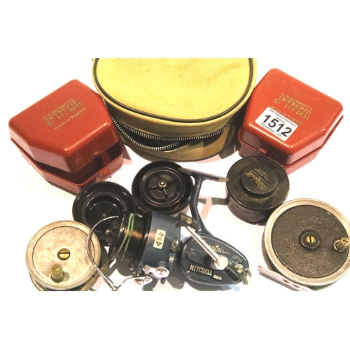 1512 - Two unnamed fly reels, two empty K D Merritts reel cases and a Mitchell 440A reel with two spare spo... 