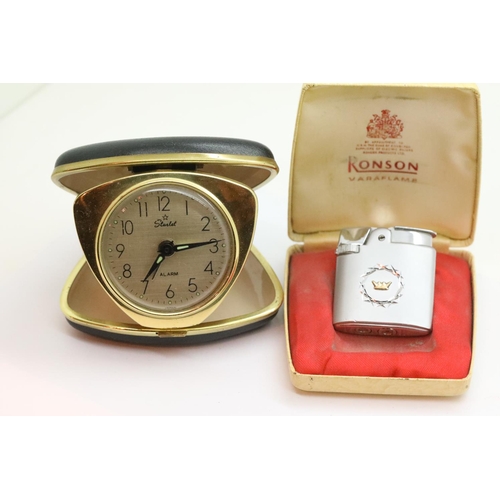 101 - Boxed Ronson Varaflame lighter and vintage travel alarm clock. P&P Group 1 (£14+VAT for the first lo... 