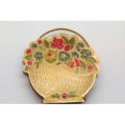 124 - Yellow metal floral compact with mirror and two yellow metal chains. P&P Group 1 (£14+VAT for the fi... 