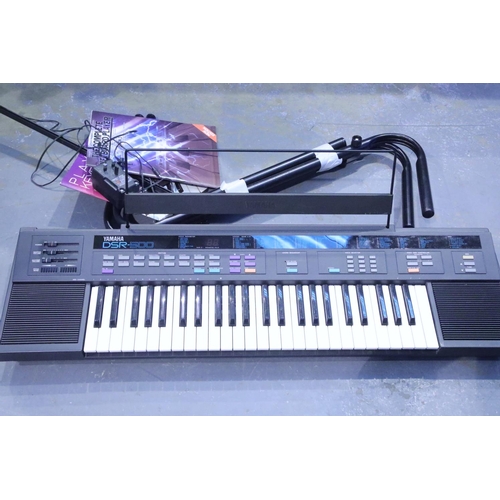 168 - Yamaha DSR-500 keyboard with stand, working. Not available for in-house P&P