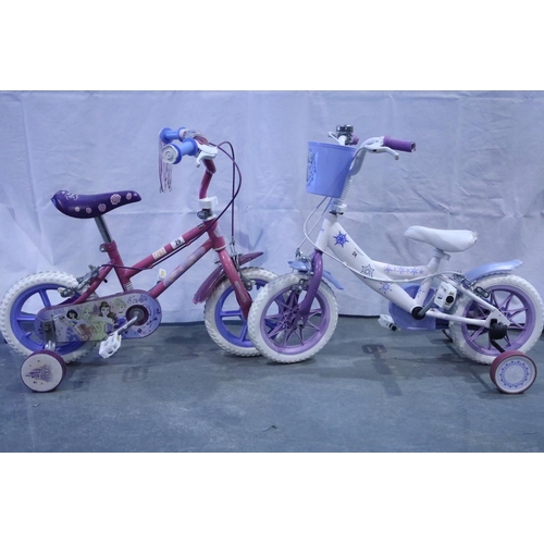 29 - Two young girls bikes with stabilizers. Not available for in-house P&P