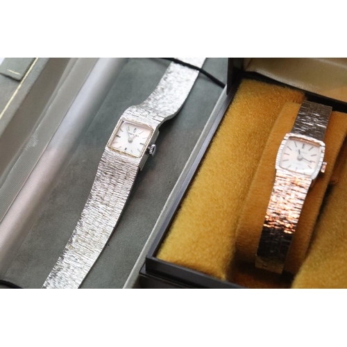 113 - Two white metal ladies boxed wristwatches, Excalibur and Sequenta. P&P Group 1 (£14+VAT for the firs... 