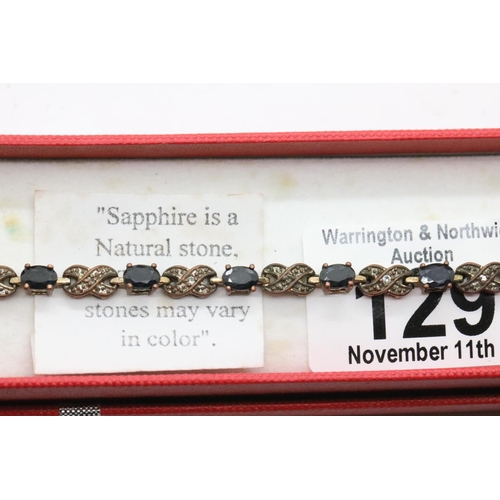 129 - Boxed sapphire set bracelet. P&P Group 1 (£14+VAT for the first lot and £1+VAT for subsequent lots)