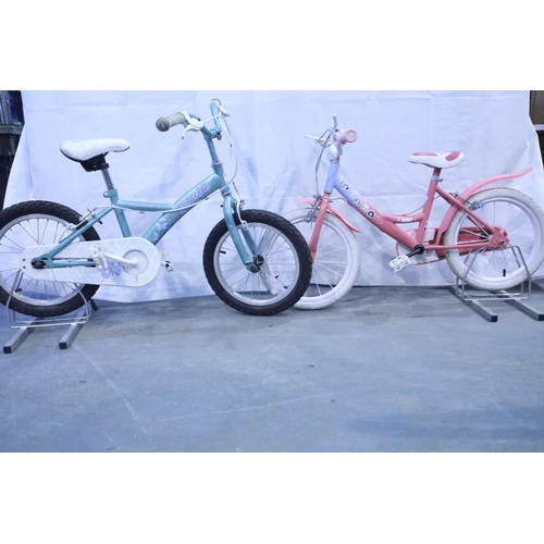 45 - Two girls pedal bikes with 10