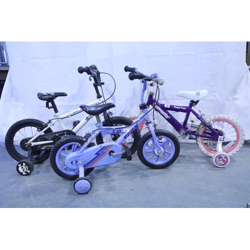 50 - Three children's bikes with stabilizers. Not available for in-house P&P