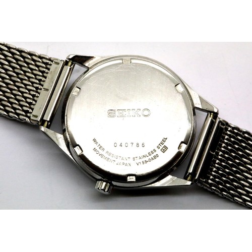 1085 - Seiko Solar gents wristwatch on a stainless steel mesh bracelet. P&P Group 1 (£14+VAT for the first ... 