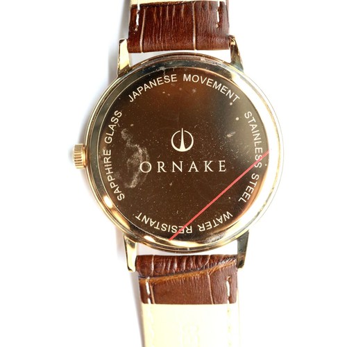 1099 - Boxed Ornake gents wristwatch, gold plated with white face and Japanese Miyota movement.  P&P Group ... 