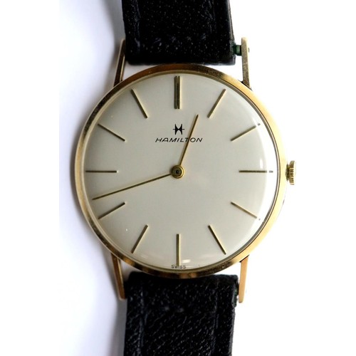 1101 - Hamilton 14ct gold cased slimline gents wristwatch on a leather strap. P&P Group 1 (£14+VAT for the ... 