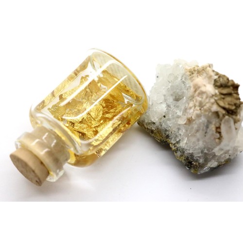 1108 - Quantity of gold leaf in oil and a Welsh gold natural rock. P&P Group 1 (£14+VAT for the first lot a... 