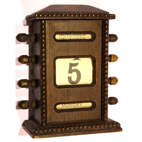 1282 - Oak cased 1940's perpetual calendar, H: 15 cm. P&P Group 2 (£18+VAT for the first lot and £3+VAT for... 