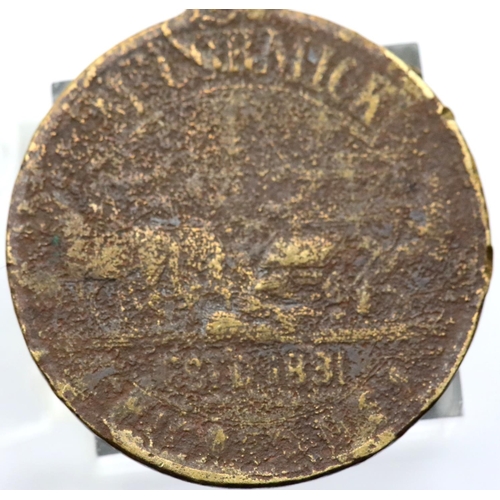 1214 - Worn brass McCormick medal. P&P Group 1 (£14+VAT for the first lot and £1+VAT for subsequent lots)