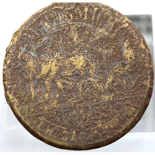 1214 - Worn brass McCormick medal. P&P Group 1 (£14+VAT for the first lot and £1+VAT for subsequent lots)