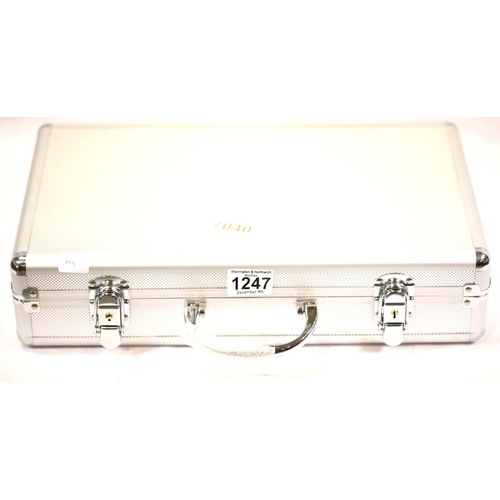 1247 - An aluminium coin collectors case with five trays, as new with keys. P&P Group 2 (£18+VAT for the fi... 