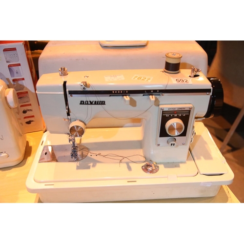 592 - Novum cased sewing machine (unchecked). Not available for in-house P&P