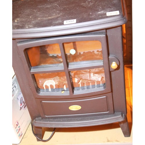 600 - Dimplex electric log effect fire. Not available for in-house P&P
Condition Report: All electrical it... 